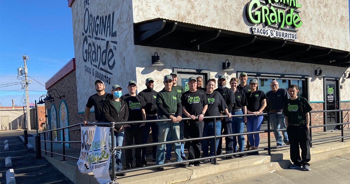 The Original Grande staff standing in front of the Salina, Kansas location